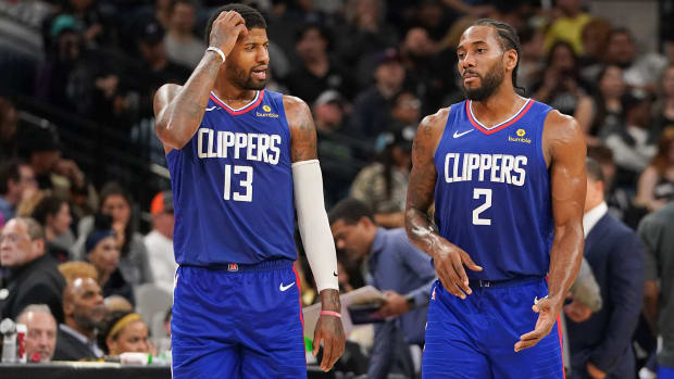 L.A. Clippers forward Paul George (13) and forward Kawhi Leonard
